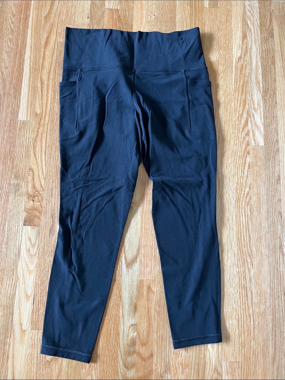 Athleta Black High-Rise Womens Leggings with Side Pockets. Size Medium